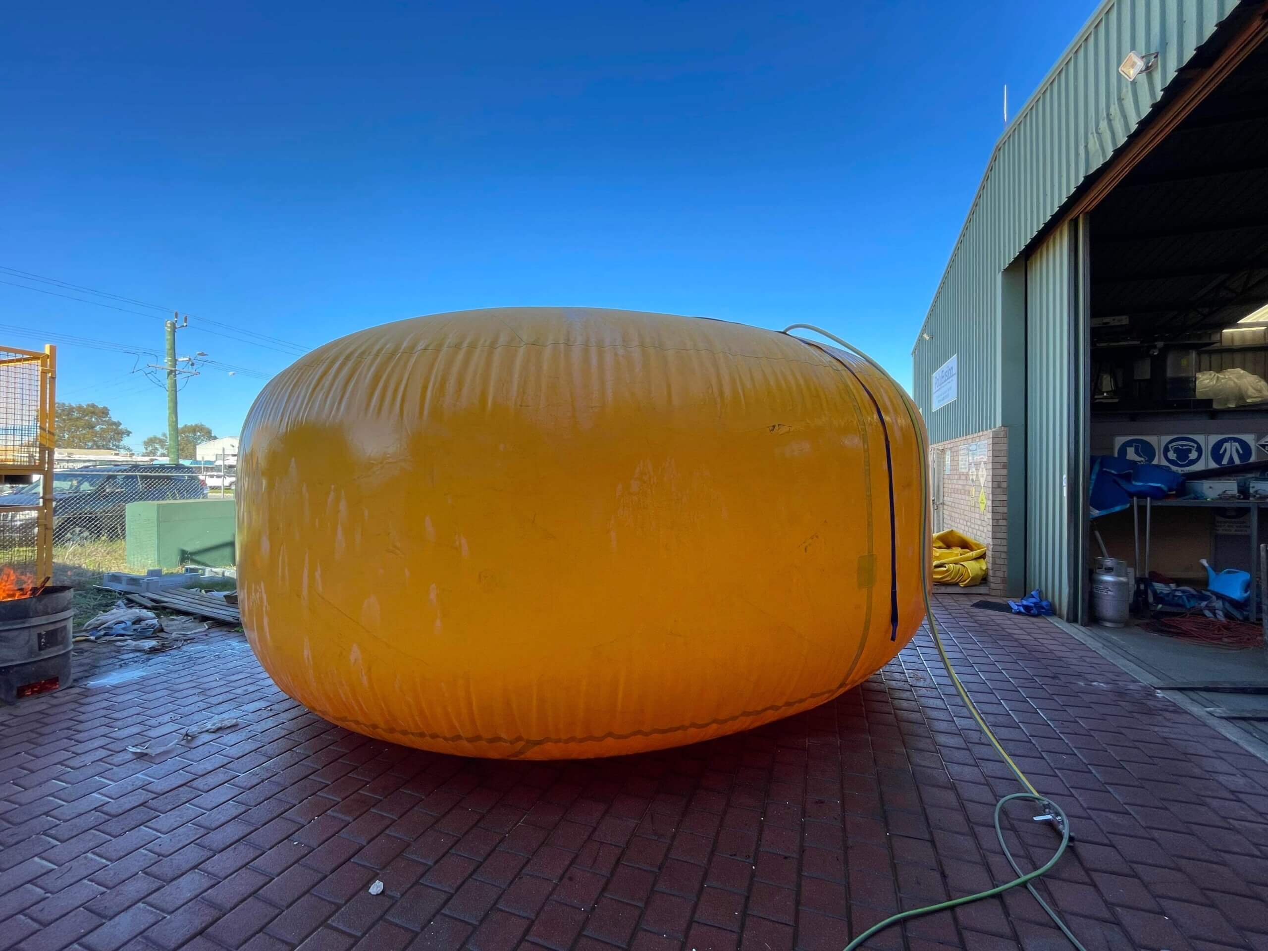 Clean industrial inflatable following inspection and repair work.
