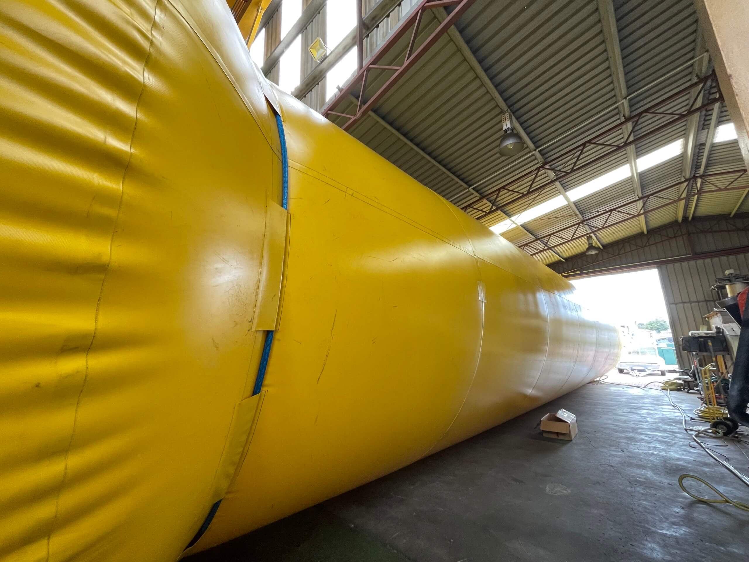 Large industrial inflatable shaft plug undergoing workshop inspection at PolyFusion WA.